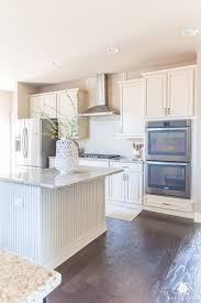 Neutral Kitchen With Perfect Greige Paint And Cream Cabinets Giallo Ornamental Granite Cottage Kitchen Design Greige Kitchen New Kitchen Cabinets