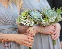 This amazing pink, purple & succulents bouquet bridal bouquet was photographed by diana marie photography and designed by portland wedding + event designer fleurology. Austin Wedding Family Commercial Photographer Succulent Bouquet Bridesmaid Succulent Bouquet Wedding Wedding Bridesmaid Bouquets