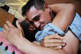 U.S. Army Sgt. 1st Class Sal Somoza, top, security