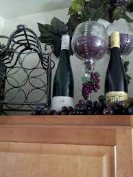 Hang a silhouette wine bottle cutout on your wall and add. Pin By Rima Vasilakis On Diy Crafts Grape Decor Wine Decor Kitchen Wine Theme Kitchen