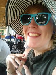 Happy kate with her beach hat