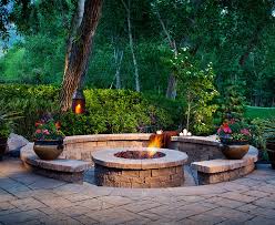 Ready pizza getting from oven. Outdoor Fireplace Western Materials