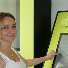 Scribbler and FujiFilm press buttons with new card kiosk