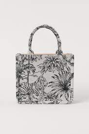 An oversized tote which features embroidered canvas, the bag can be carried by hand or on the shoulder. Best Dior Book Tote Dupe Bags From 15 Surgeofstyle By Benita