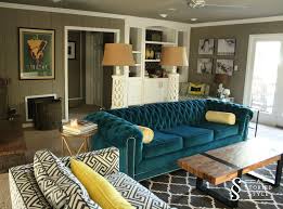 This idea shows the living room in gray which is wide enough for the big furniture. Pin By Becca Powers On Living Room Teal Sofa Living Room Teal Living Rooms Teal Couch Living Room