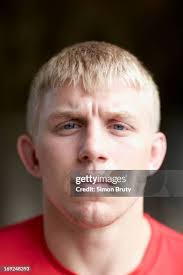 Closeup portrait of Cornell Kyle Dake posing during photo shoot on... News  Photo