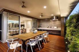 Like The Indoor Dining Table With Cane Colour Chairs And A Dark Rug Under Cuisine Exterieur Cuisine Exterieure Deco Exterieure