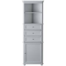 A freestanding black metal linen cabinet with glass doors is positioned beside a light gray. Home Decorators Collection Hampton Harbor 22 In W X 10 In D X 67 1 2 In H Linen Storage Cabinet In Dove Grey 3987020270 The Home Depot