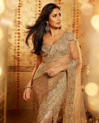 Katrina Kaif Throws Sparkle In A Golden Saree; PHOTOS