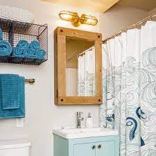 In the event that you need to make a more profound, more extravagant theme, utilize darker blues and more vibrant browns in your bathroom. Nautical Bathroom Ideas
