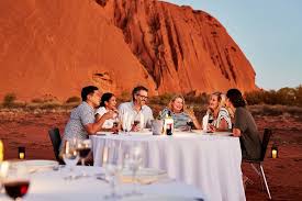 The landscape is so much more than red sand, sweeping desert plains and weathered arkose sandstone. Uluru Ayers Rock Sunset With Outback Barbecue Dinner And Star Tour 2021