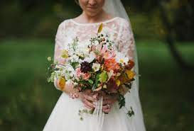 Peonies, lillies, roses, oh my! Choose Seasonal Blooms For Your Autumn Wedding The Natural Wedding Company The Natural Wedding Company