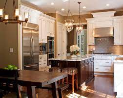 Modern kitchen with fancy cabinets and floating wooden desk. A Look At Traditional Contemporary Kitchens