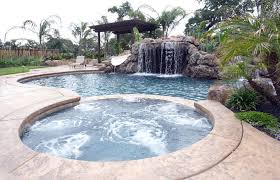 Inground spa with sheer waterfall features in a cool master bath design; 37 Swimming Pool Water Features Waterfall Design Ideas Designing Idea