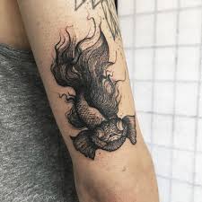 Fish tattoos are super cute and some people prefer big tattoos whereas some people love getting small and tiny tattoos made on their bodies. Betta Fish Tattoo Abyss Montreal