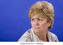 Woman Looking Melancholy On Blue Back Stock Photo 11546269