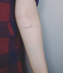 100 Initial Tattoos Perfect For Proclaiming Your Love For Your Partner In 2020 Initial Tattoo Minimalist Tattoo Subtle Tattoos