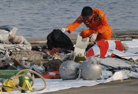The plane crashed into the side of the runway and burst into flames. Indonesia Plane Crash Search Finds Remains Debris At Sea