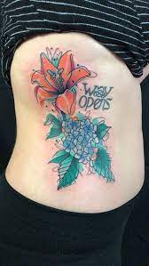 We are located in los angeles, ca. Watercolor Flower Tattoo By Tim Mueller In Los Angeles Leaf Tattoos Tattoos Watercolor Tattoo Flower