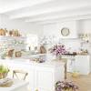 White kitchen ideas range everywhere from cabinet types, backsplashes, and wall elements to a big marble kitchen island. 1