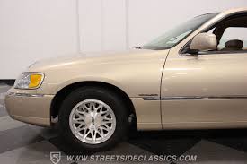 Image result for Medium Gold 1998 Town Car