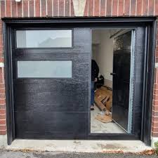 Image result for door within a garage door