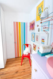 Switch to a microfiber paint roller to paint the rest of the door. Diy Rainbow Nursery Door Pmq For Two