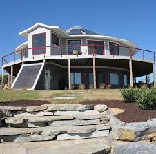 Five Unique Sustainable Beautiful Prefab Homes Deltec Homes Round House Prefab Homes Prefab