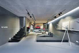 The alternation of smooth green surfaces, cement floors, black metal details and trendy furniture with the warmer presence of the exposed red bricks and soft textiles is an intriguing and. An Ultra Modern House In Hong Kong With A Glass Walled Garage Idesignarch Interior Design Architecture Interior Decorating Emagazine