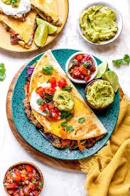 These Quesadillas Are Loaded With Beans Avocado Fresh Veggies And Cheese This Easy Quesadilla Recipe Is Per In 2020 Quesadilla Recipes Easy Easy Quesadilla Recipes