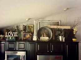 Try one of these 10 inventive ways to fill the space from display to storage. Image Result For Primitive Decorating Above Cabinets Pinterest Decorating Above Kitchen Cabinets Above Cabinet Decor Top Of Cabinet Decor
