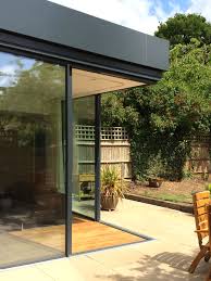 Thinking about installing a glass garage door? Open Corner Created With Minimal Windows Sliding Glass Doors Richmond Park Iq Glass Sliding Doors Exterior Sliding Glass Door Sliding Doors Interior