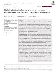 Elegantly dressed businessman sitting on the bench in park and reading on a tablet. Pdf Modelling Bat Distributions And Diversity In A Mountain Landscape Using Focal Predictors In Ensemble Of Small Models