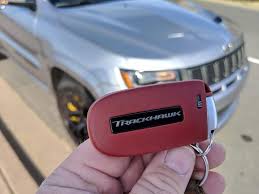 grand cherokee trackhawk is a dumb idea but we love it jeep grand cherokee dodge charger hellcat jeep