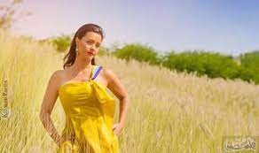 نور تتألق بالأصفر في صور حملت توقيع خالد فضة women summer dresses fashion
