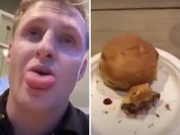 Man bee sting tongue eating burger