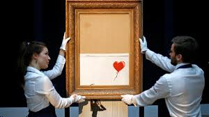 Art connoisseurs could only watch in horror as an expensive piece was shredded before their eyes. Banksy Posts Video Saying Incomplete Shredding A Malfunction The National
