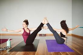 Young Woman Doing Partner Yoga Together In Class By Kate Daigneault Yoga Photos Partner Yoga Gym Partner