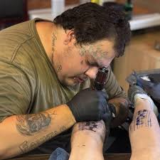 Tattoo artist recommendations near St. Louis for small tattoos