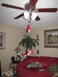 Trixie Magic Hanging From The Ceiling Fan With Images Holiday Decor Decor Ceiling Fan