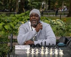 Image of Washington Square Park in NYC with chess hustlers