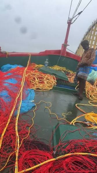 Fishing boats lie anchored along the Arabian Sea coast at Uttan Beach on the outskirts of Mumbai, Sunday, June 14, 2026, as the annual fishing season draws to a close ahead of