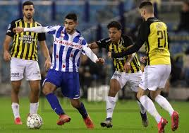 Fenerbahçe'nin transfer listesindeki isimlerden biri olduğu iddia edilen oussama tannane'nin biyografisi, sarı lacivertli takımın taraftarları tarafından merak ediliyor. Soccrates Images L R Oussama Tannane Of Vitesse Rami Hajal Of Sc Heerenveen Million Manhoef Of Vitesse Matus Bero Of Vitesse