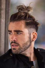 24 New Masculine Takes On Samurai Hair For Modern Warriors Man Bun Hairstyles Man Bun Haircut Long Hair Styles Men