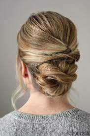 From Braided Buns To A Messy Pretzel Chignon Here Are The 11 Best Easy Updo Hairstyles We Could Find Easy Updo Hairstyles Braided Hairstyles Updo Hair Styles