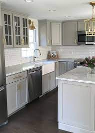 Kitchen design ideas gray cabinets. We Love This Stylish Gray Kitchen With Goldhardware Kitchen Remodel Small Kitchen Renovation Home Kitchens