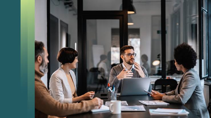 Pillar Talent Consulting professionals discussing tax advisory services, strategic planning, and CFO consulting to support organizational growth and informed decision-making.