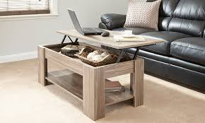 It has between one and two hydraulic pistons that will allow you to easily lift the top on expanding hinges. Julie Lift Up Storage Coffee Table In Walnut Living Room