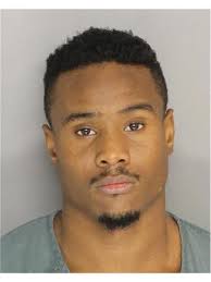 Local man charged following home invasion