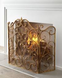 Gold Fireplace Screen Horchow Com The fire guard sits in front of your fireplace and acts as a barricade between the fire and the rest of you can pick a simple steel fire screen that encloses your entire fireplace.